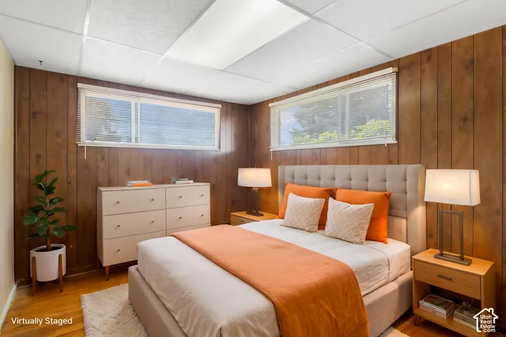 Wood-panel wall finishes with a drop ceiling