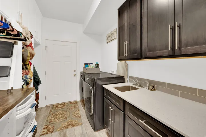 White walls and light wood-finish flooring