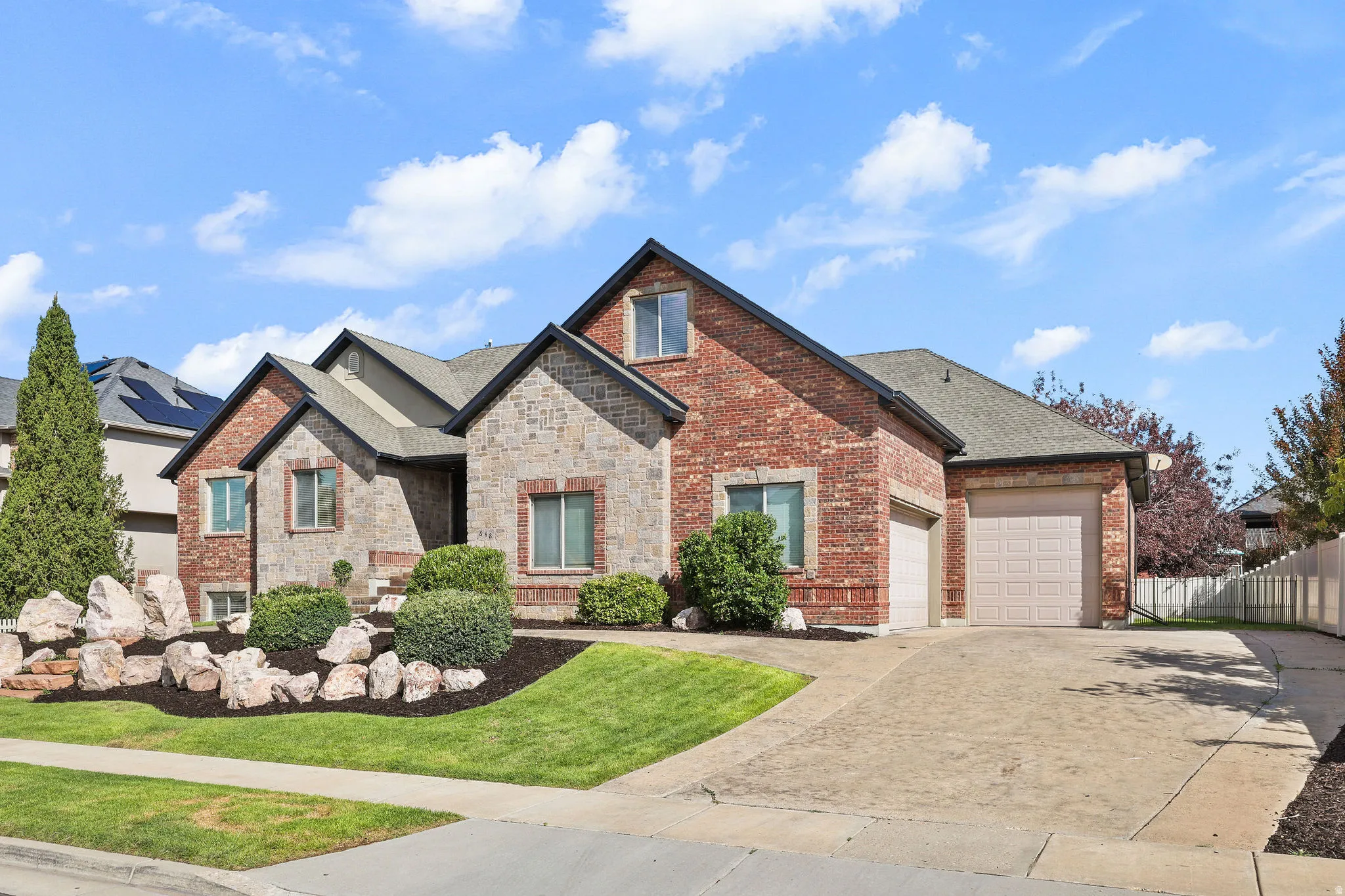 Brick and stone exterior with gabled roof lines