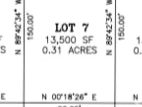 Survey Plat. Detailing the dimensions and area of Lot 7 within the property
