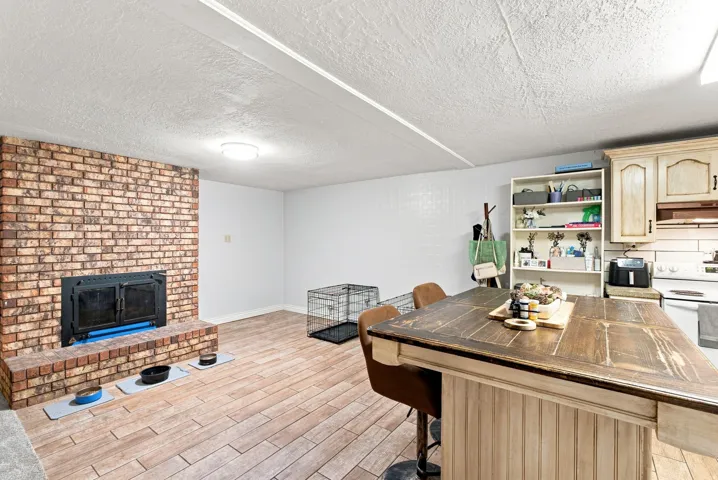 Brick-clad fireplace with a wood-burning insert