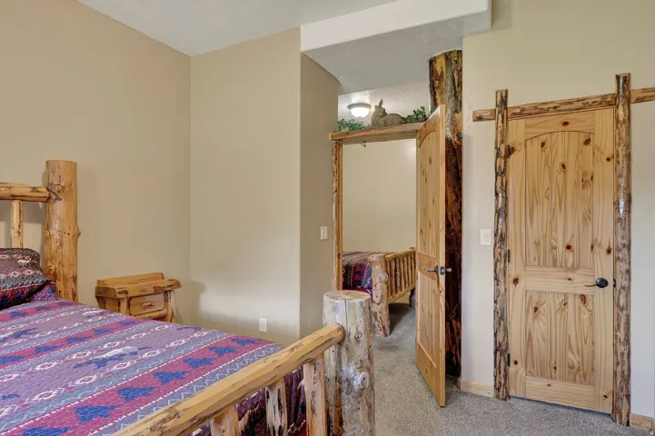 Wood-finish doors with rustic log trim