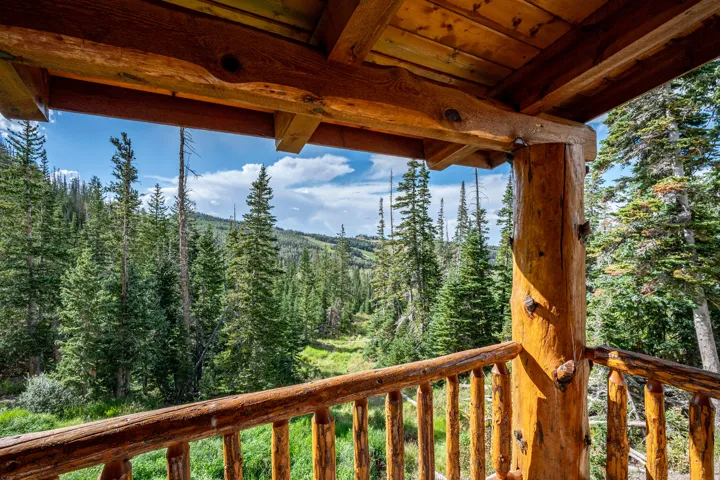 Wooden log railing with a natural finish