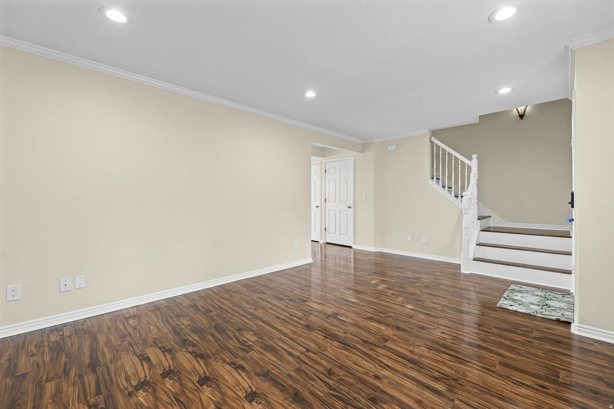 Living area and stairs to 2nd floor
