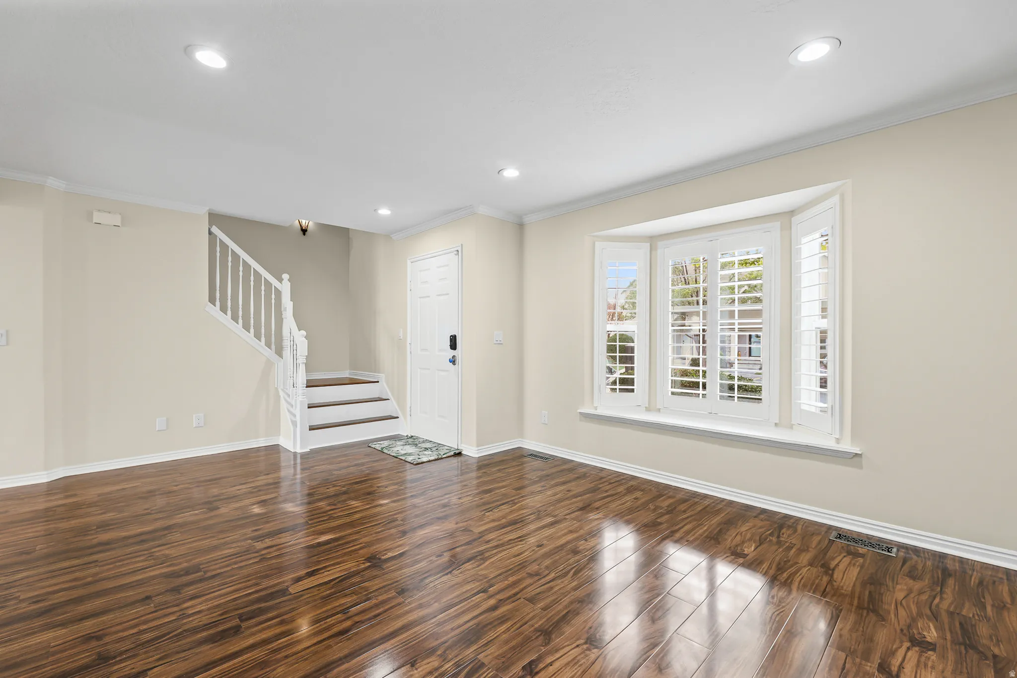 Living area and stairs to 2nd floor