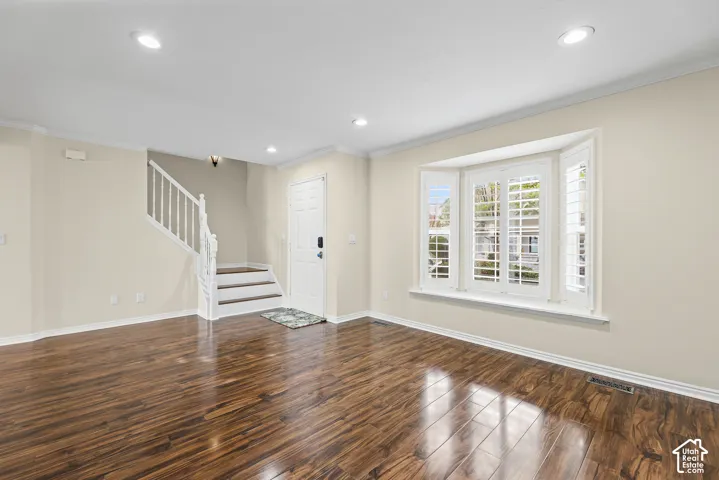 Living area and stairs to 2nd floor