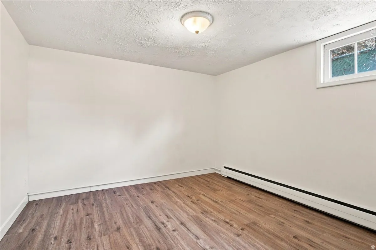 Wood-finish flooring with white walls