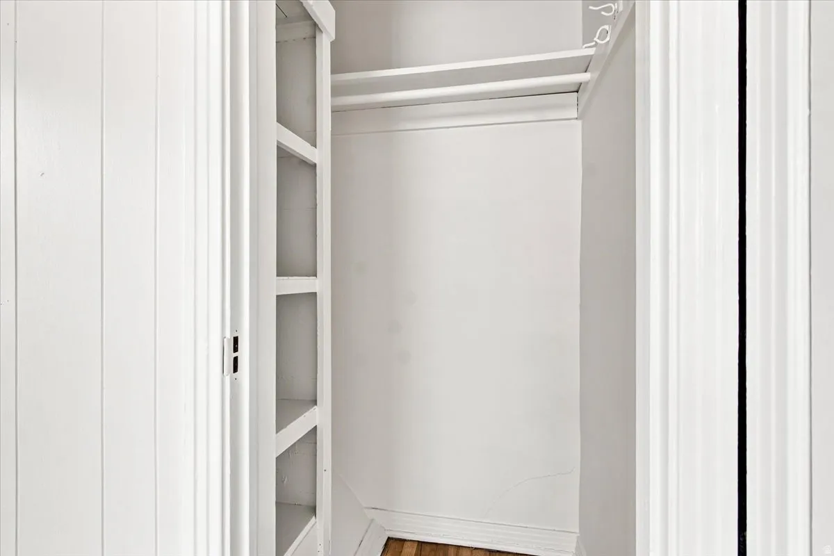 Built-in shelving and dual clothing rods