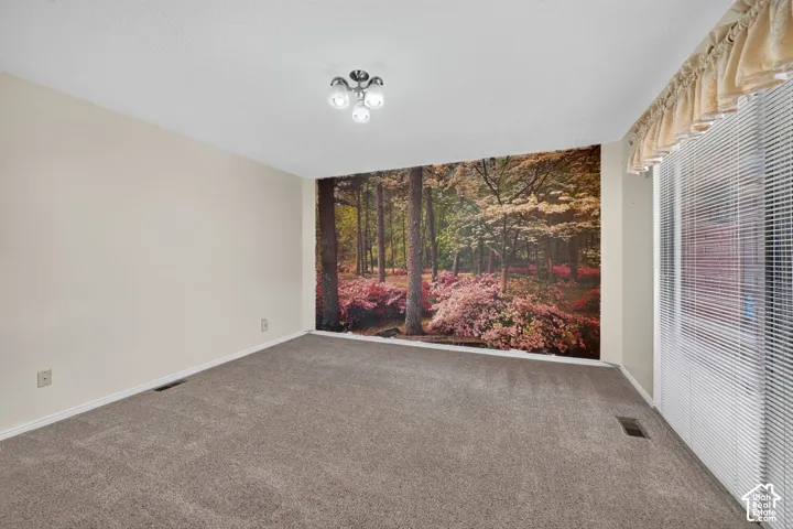 This room is located off the entry area which would make a great office as well.