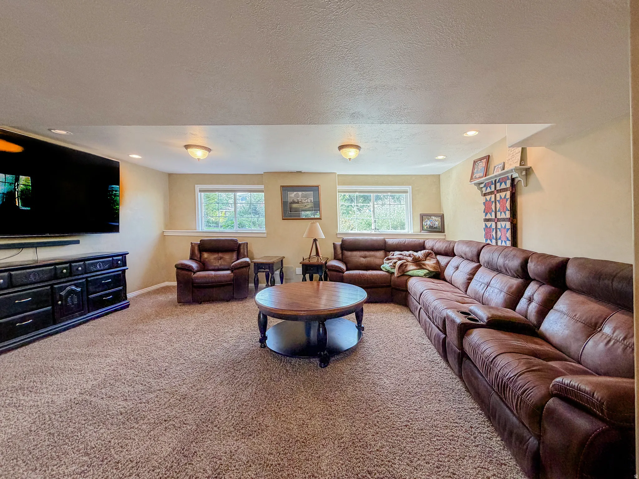 Recessed lighting, surface-mounted lighting fixtures, and windows provide illumination