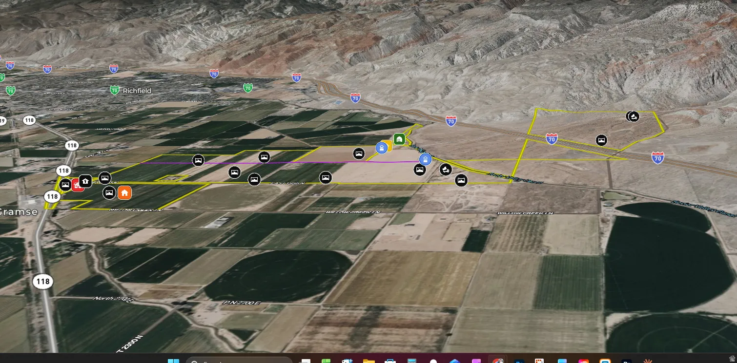 Satellite Imagery. Depicting a rural landscape with agricultural fields, road networks, and marked property boundaries