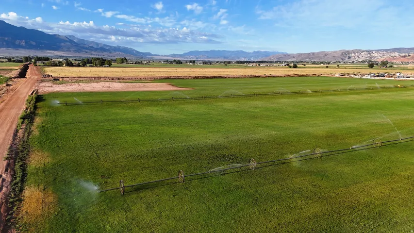 Expansive green fields with irrigation systems