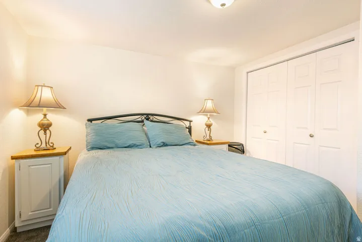 White walls and ceiling-mounted light fixture illuminate the room