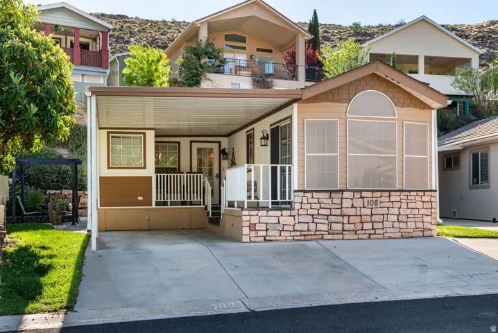 Carport entry with a concrete drive
