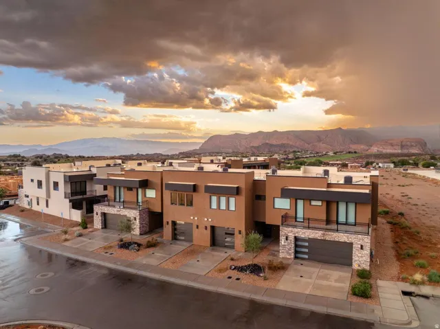 Modern architectural style featuring flat roofs and multiple balconies