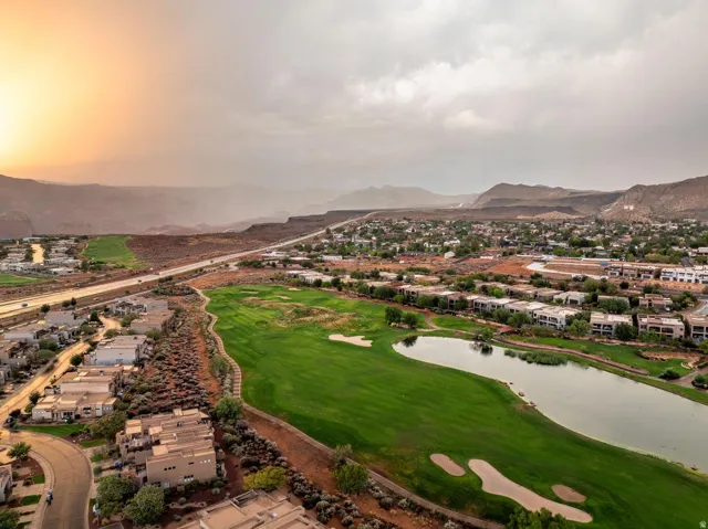 Expansive golf course with water feature