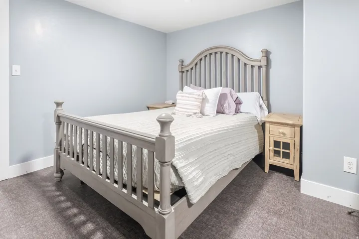 Soft gray wall color with white trim