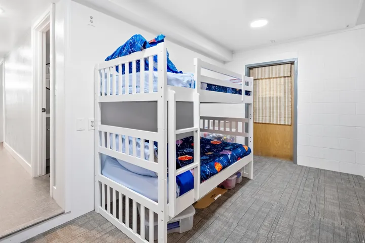 Wood-finish flooring with white walls