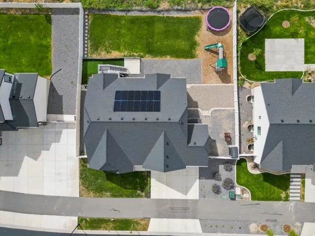 Asphalt shingle roof with integrated solar panels