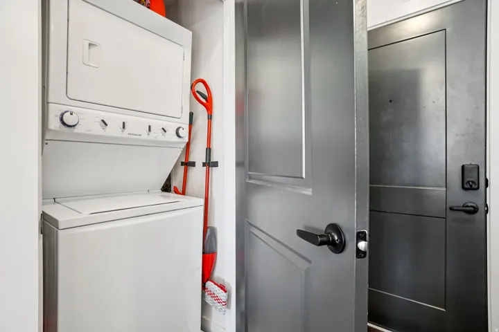 Stackable washer and dryer unit