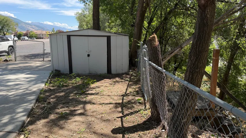 Detached storage shed with double doors