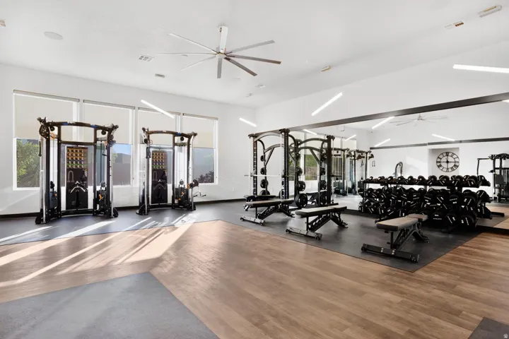 Dedicated fitness room with wood-finish and rubber flooring