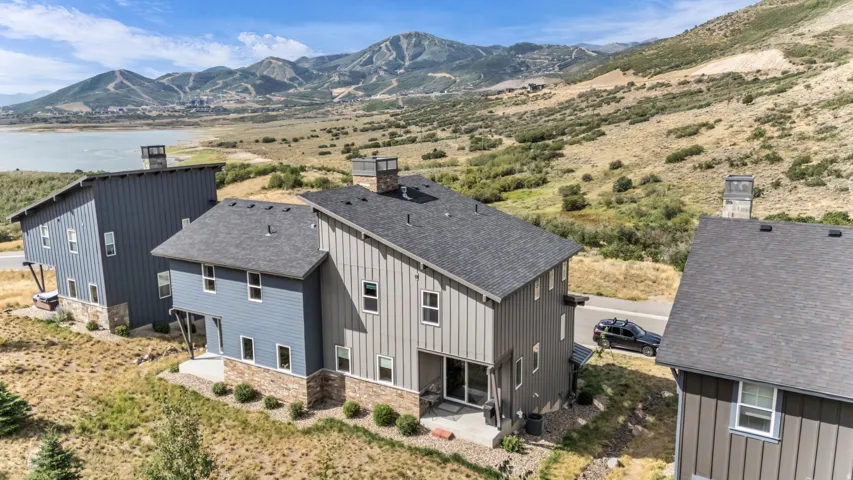 Vertical board-and-batten siding with stone accents