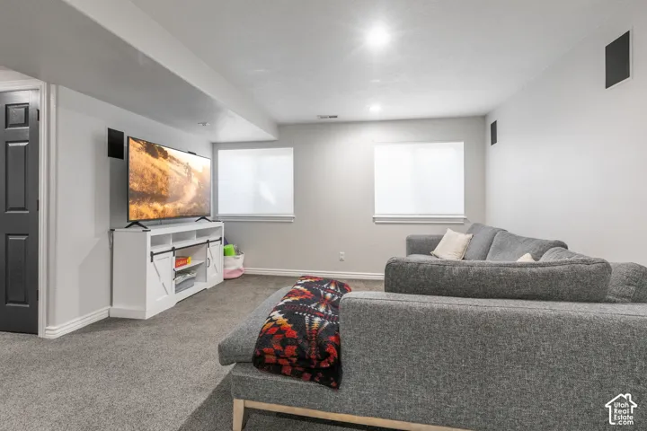 Rec room on lower level with natural light.