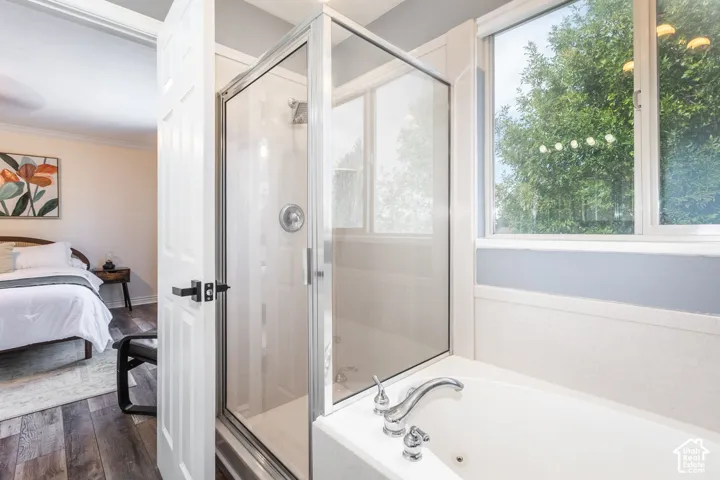 Primary en-suite with tub and separate shower.