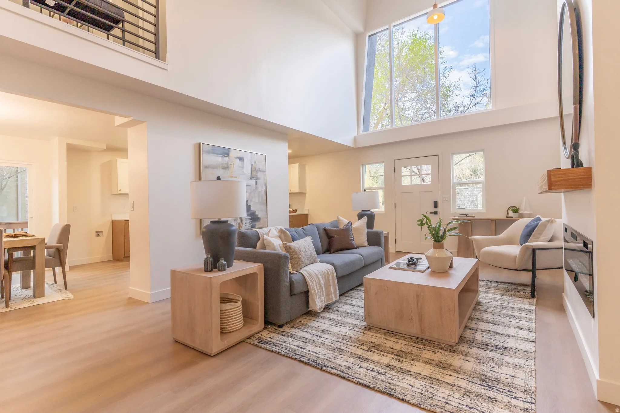 Soaring ceilings with transom windows