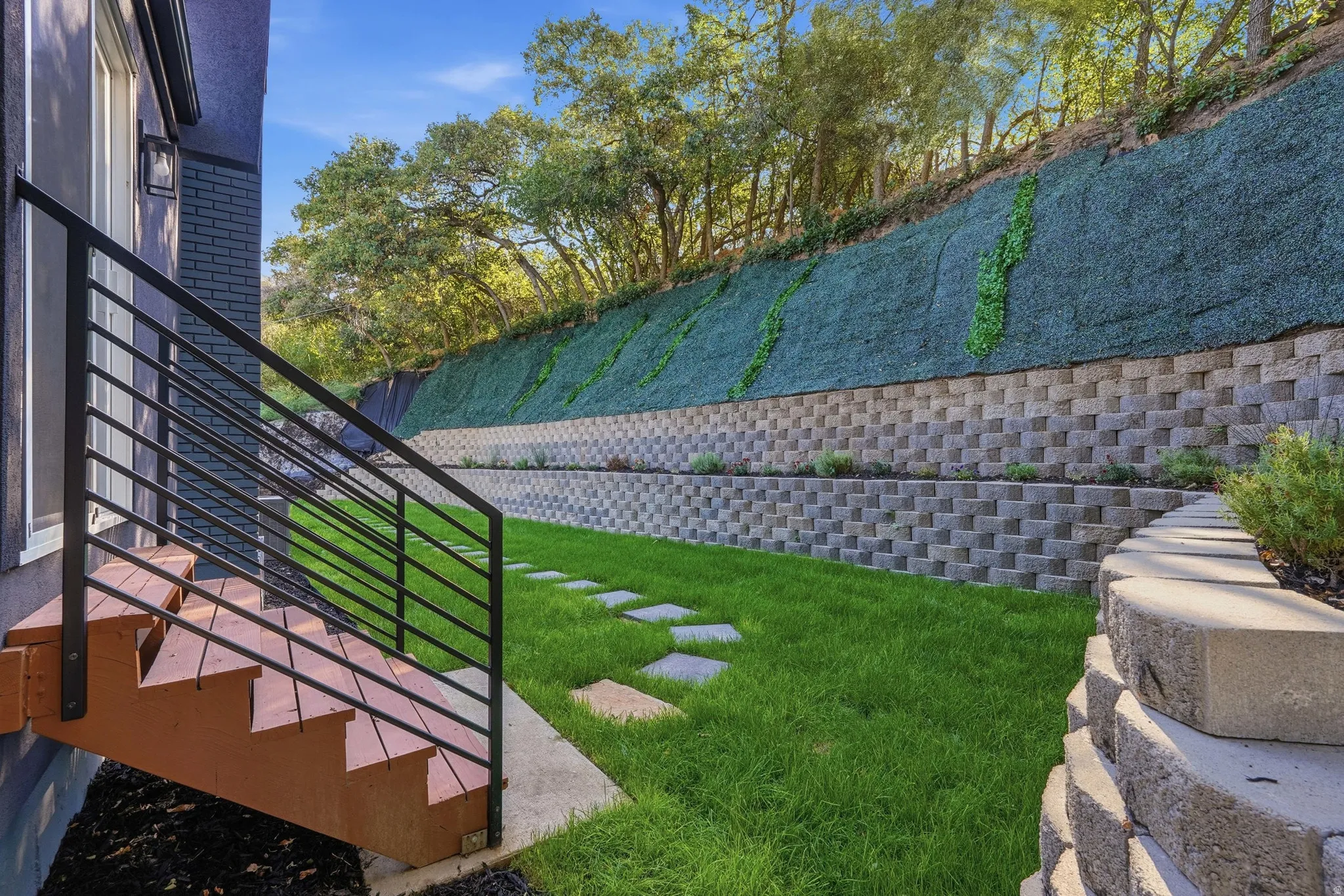 Wood-finish exterior stairs with metal railing