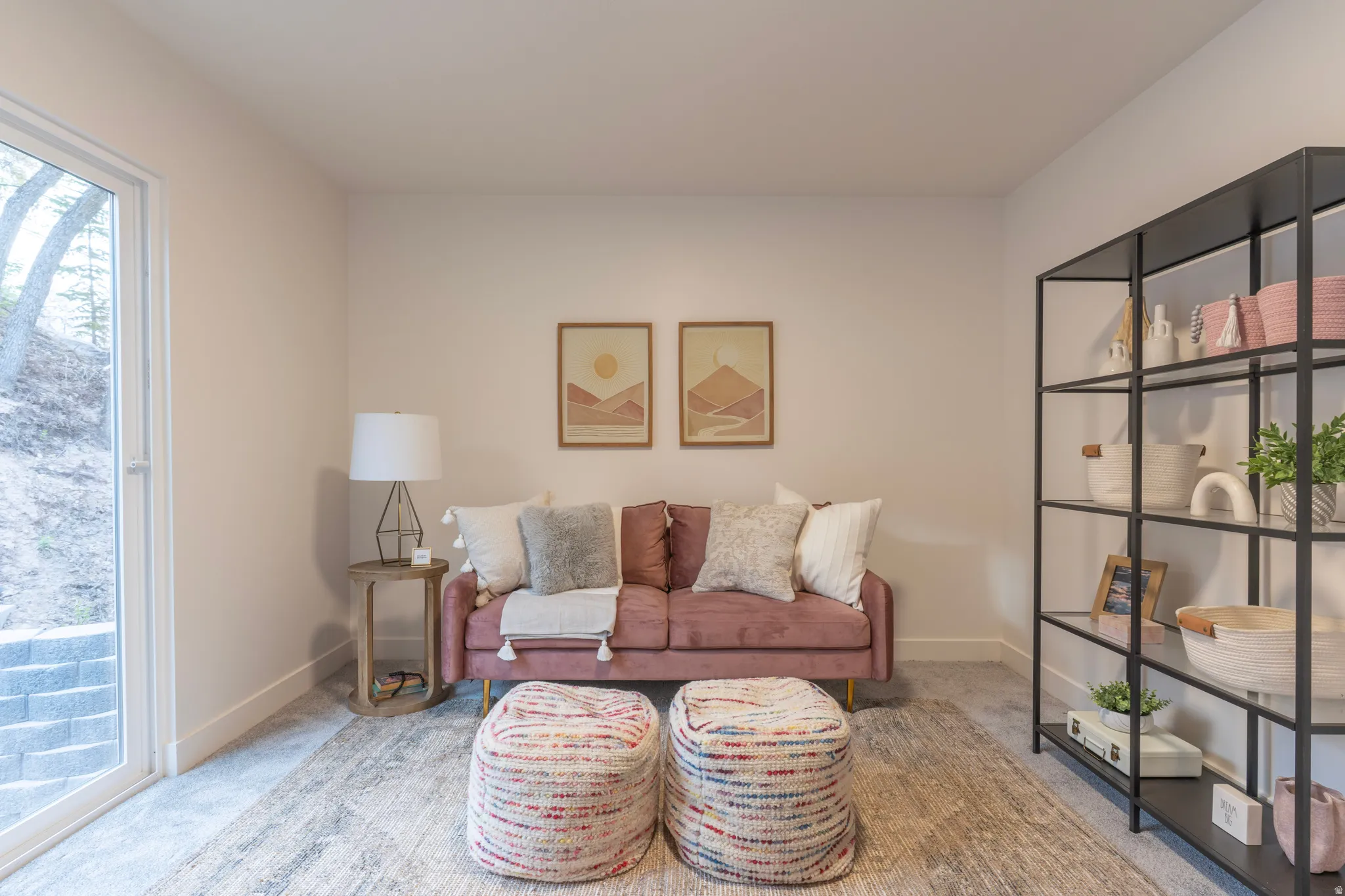 Recessed lighting, light-toned walls, and a glass-paneled exterior door