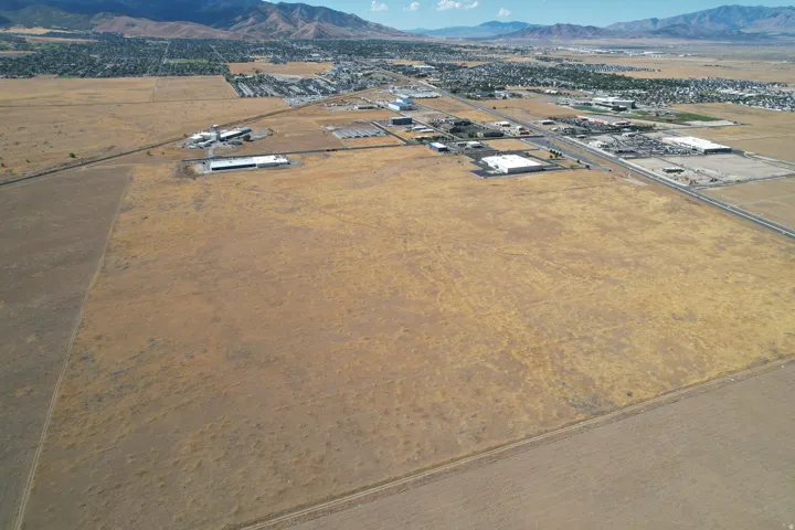 Expansive undeveloped parcel featuring a flat topography and direct road frontage