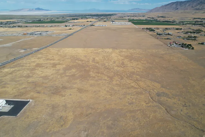Expansive undeveloped land featuring a broad, flat terrain
