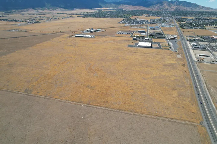Expansive undeveloped land featuring a distinct boundary line