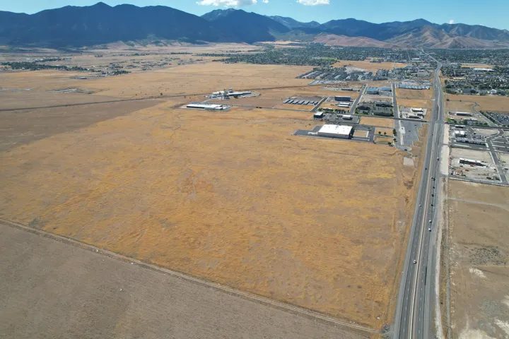 Expansive undeveloped land with a highway frontage
