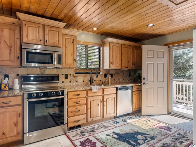 Wood-panel ceiling with recessed lighting