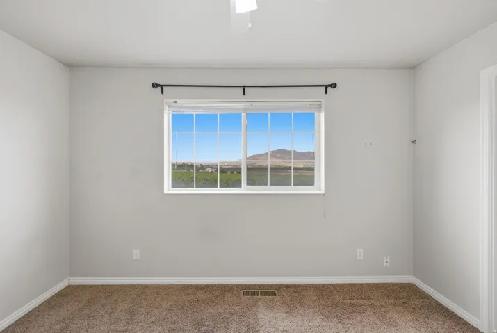 Expansive window with mountain and landscape scenery