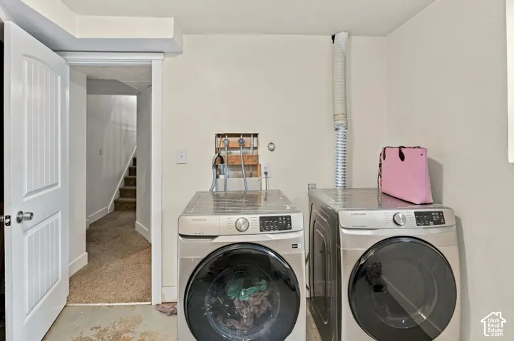 Dedicated laundry area featuring modern appliances
