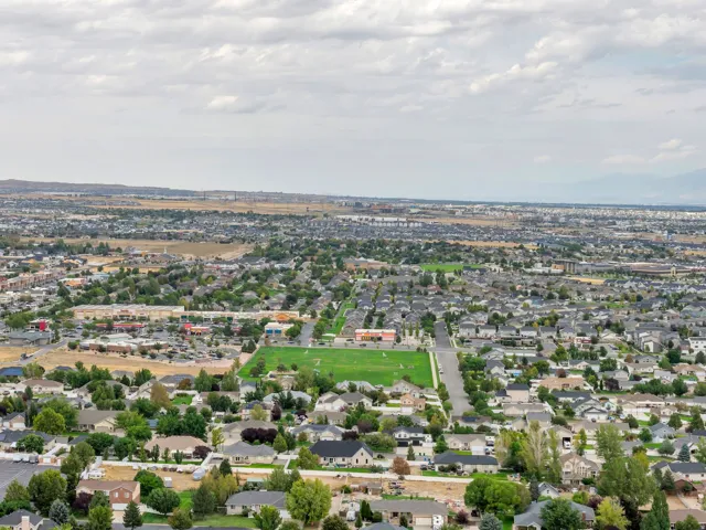 Aerial perspective showcasing an expansive residential area with varied housing styles