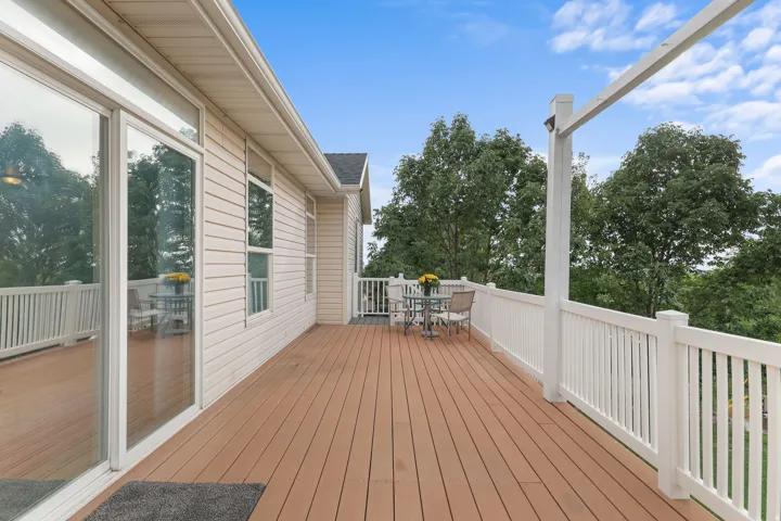 Expansive outdoor deck with wood-finish flooring