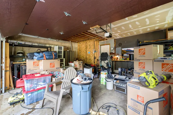 Concrete flooring with a built-in workbench and overhead storage