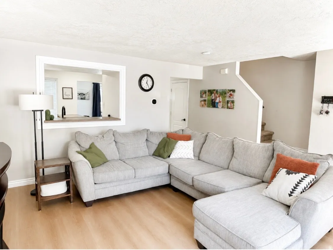 Light wood-finish flooring with neutral wall paint throughout