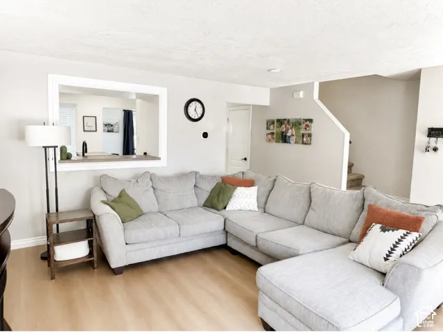 Light wood-finish flooring with neutral wall paint throughout
