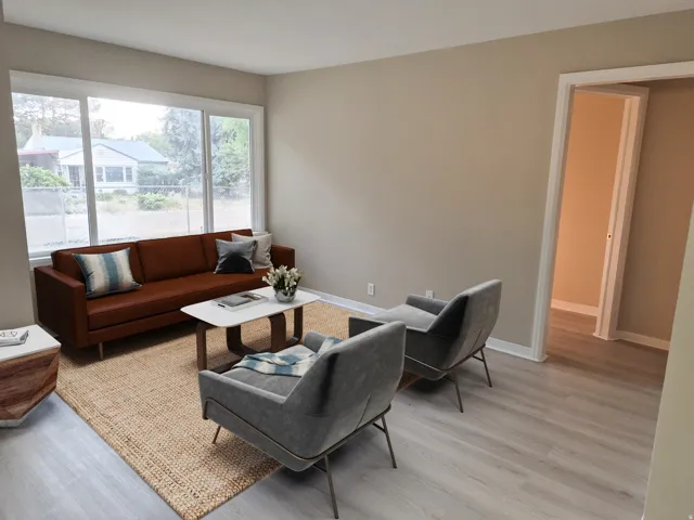 Light-toned walls complement wood-finish flooring