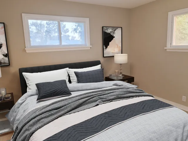 Neutral-toned walls complement multiple windows with white trim