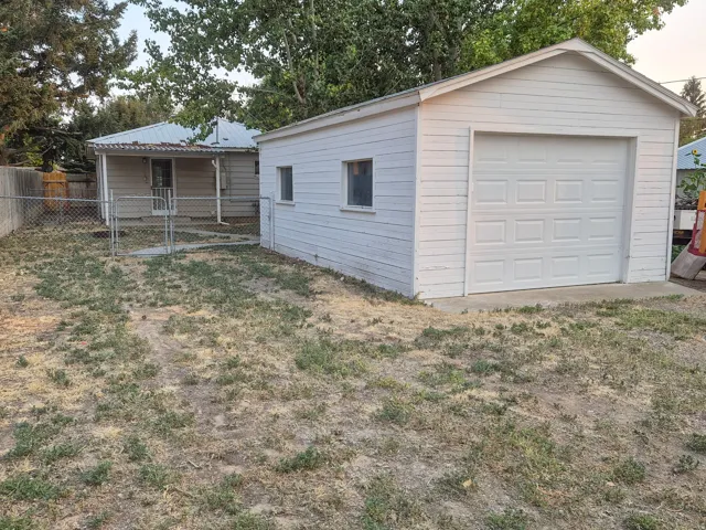 Detached garage with a paneled door