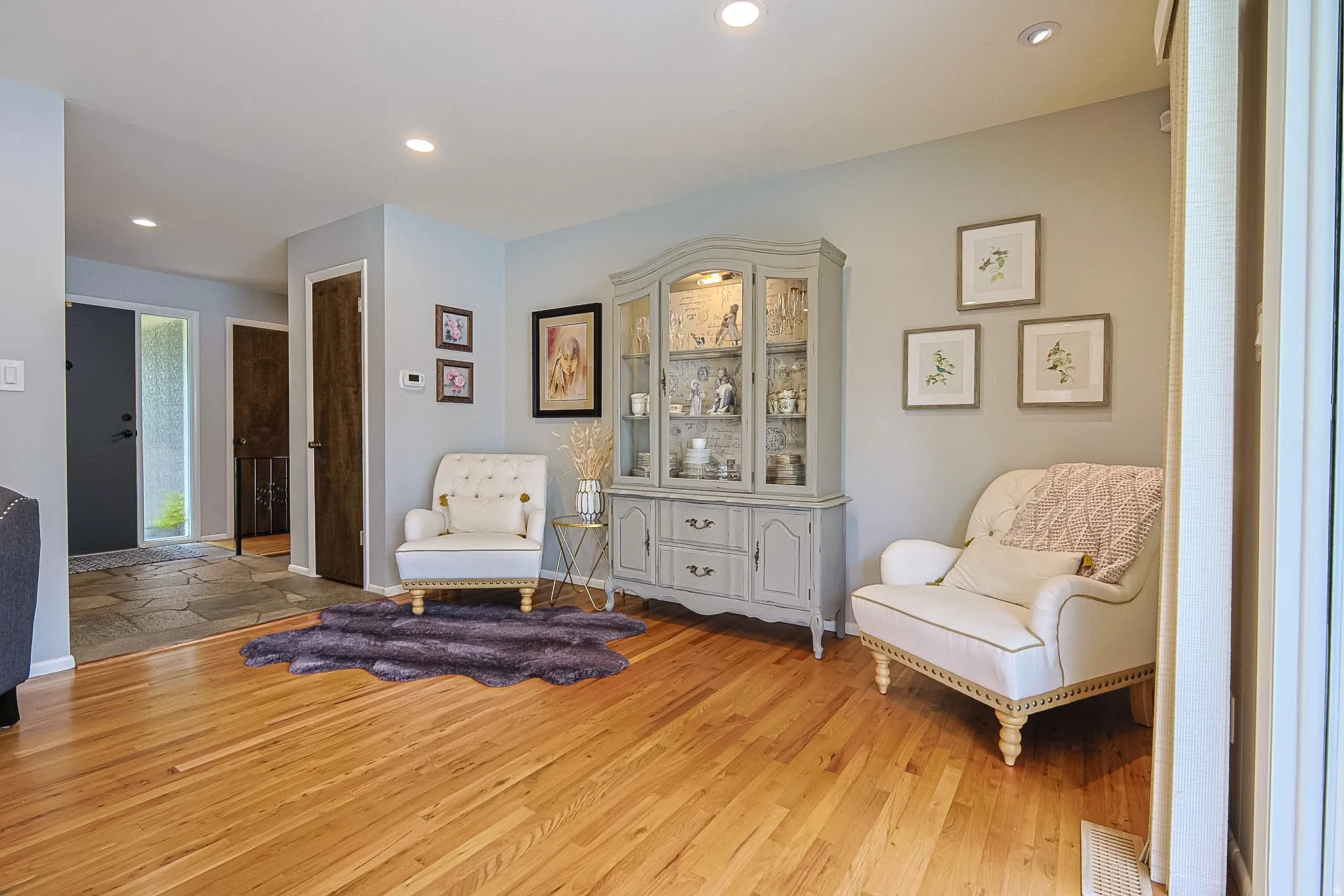 Hardwood flooring throughout the living area