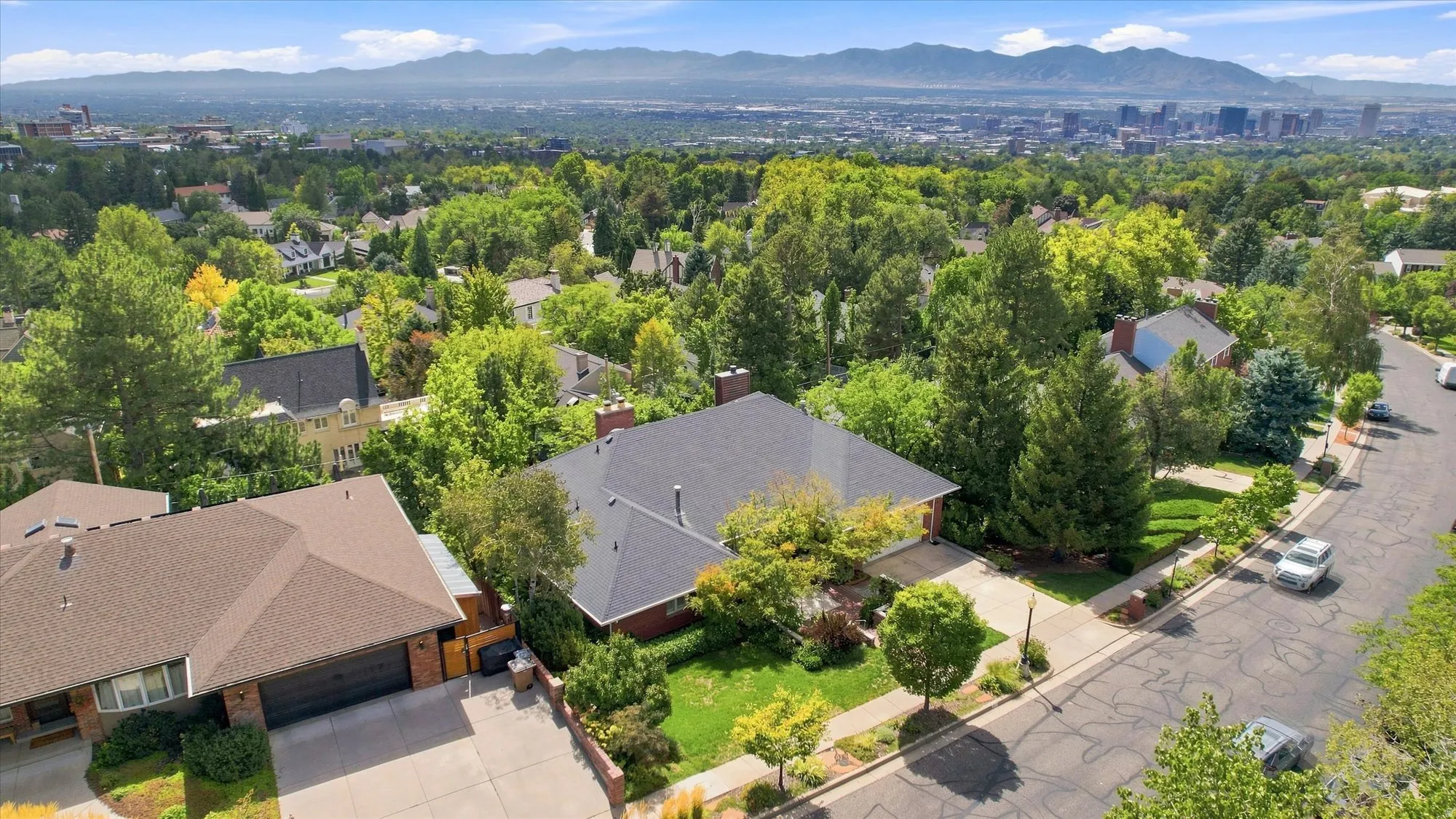 Prime Federal Heights location with a mountain backdrop and a city skyline