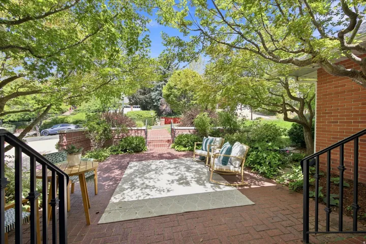 Inviting front patio looking out towards the street.